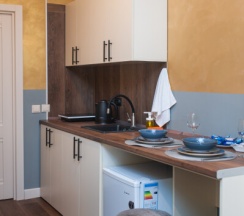 Двухместный номер с кухней, одной двуспальной кроватью с собственной ванной комнатой и дополнительным спальным местом в Goldie Home