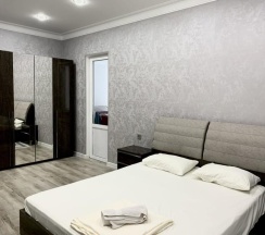 2-комнатные апартаменты улучшенные с 1 двуспальной кроватью и диваном в Apart Ru Hotel