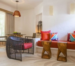 Номер Oasis в Shangri-la Caribe Beach Village Resort