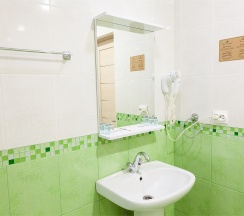 Двухкомнатный люкс с двумя раздельными кроватями в Рем Отель