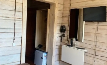 Двухместный номер Стандарт с балконом и с видом на горы (2 отдельные кровати) в Гавань Листвянка