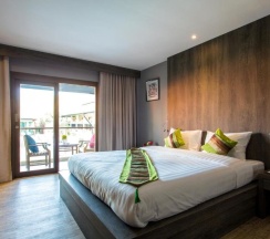 Двухместный номер Deluxe с видом на бассейн двуспальная кровать в Отель Naiya Buree Boutique Resort