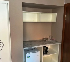 Двухместный полулюкс с балконом 2 отдельные кровати в Ушба