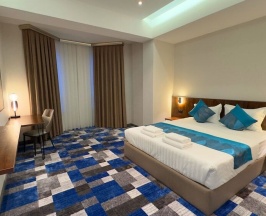Двухместный номер Deluxe с видом на город двуспальная кровать в Отель Harris Tashkent