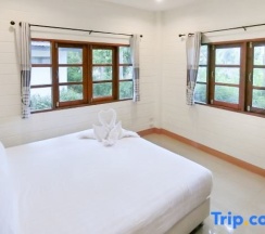 Двухместный люкс двуспальная кровать в Arthit-Thai Orchard & Resort