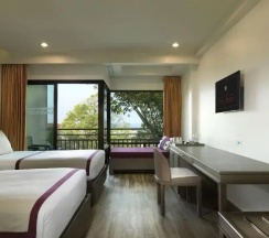 Двухместный номер Deluxe с балконом и с видом на бассейн 2 отдельные кровати в Chanalai Flora Resort, Kata Beach