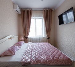 Комфортный улучшенный номер с двухспальной кроватью(King-size+) в Атмосфера