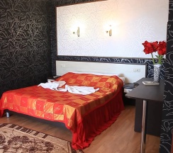 Номер люкс семейный с 1 двуспальной кроватью в Вариант