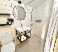 Стандартный семейный улучшенный четырёхместный номер в Жемчужина Абхазии