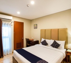 Двухместный номер Deluxe двуспальная кровать в Capital O 461 Asrodel Hotel