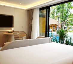 Двухместный номер Deluxe Grand Pool Plus двуспальная кровать в Wyndham Garden Naithon Phuket