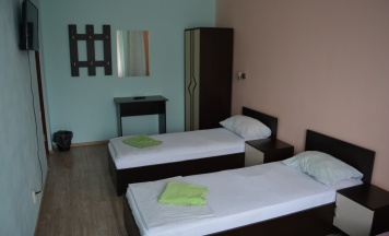 Стандарт с тремя односпальными кроватями в Гостевой дом