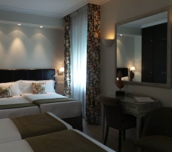Четырёхместный номер в Hotel Moderno