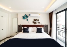 Номер Deluxe в RoomQuest Sukhumvit 36 BTS Thonglor