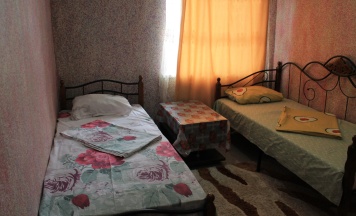 Кровать в 2-местном общем номере в Эльбрус