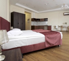 Трёхместные апартаменты с кухней и видом на Петербургские крыши в Дом паломника на Владимирской