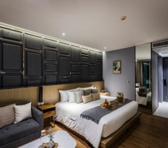 Двухместный номер Deluxe с видом на бассейн двуспальная кровать в Отель Wyndham Grand Nai Harn Beach Phuket