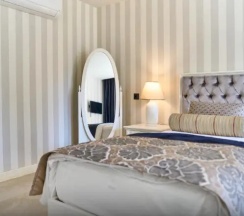 Четырёхместный семейный люкс в Salonika Suites