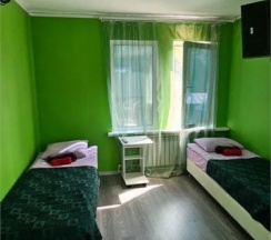 Кровать в общем номере в Камчатдар