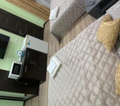 Комната стандарт семейная с 2 двуспальными кроватями в Сан бах, гостевой дом