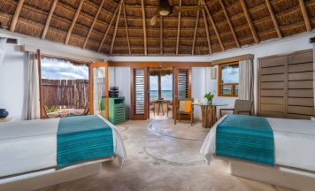 Двухместный номер oceanfront 2 отдельные кровати в Shangri-la Caribe Beach Village Resort