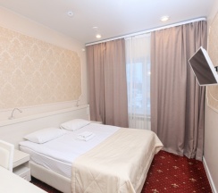 Стандартный номер с 1 или 2 отдельными кроватями в Аврора