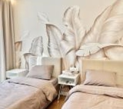 1-комнатные апартаменты стандарт с 2 односпальными кроватями в Artinvest (Артинвест) на улице Волкова