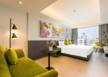 Номер Deluxe в Maitria Rama 9 Bangkok - A Chatrium Collection Hotel