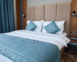 Двухместный семейный люкс с балконом двуспальная кровать в Diamond Hotel Shymkent