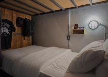 Кровать в общем номере в Sleepcase Hostel